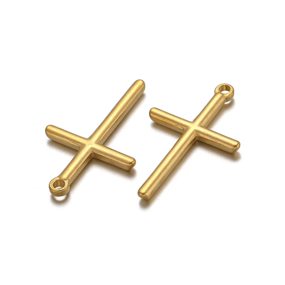 A pair of gold-toned cross charms for DIY jewelry making