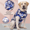 A golden retriever wearing a camouflage pet recovery suit with a back hole, showing the design details.