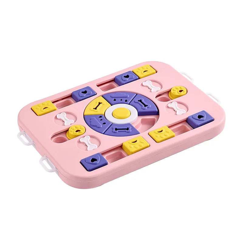 A pink interactive puzzle slow feeder bowl with various colored silicone puzzle pieces for pets.