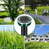 A solar ultrasonic pest repeller device shown in various outdoor settings including a garden, park, farm, and yard.