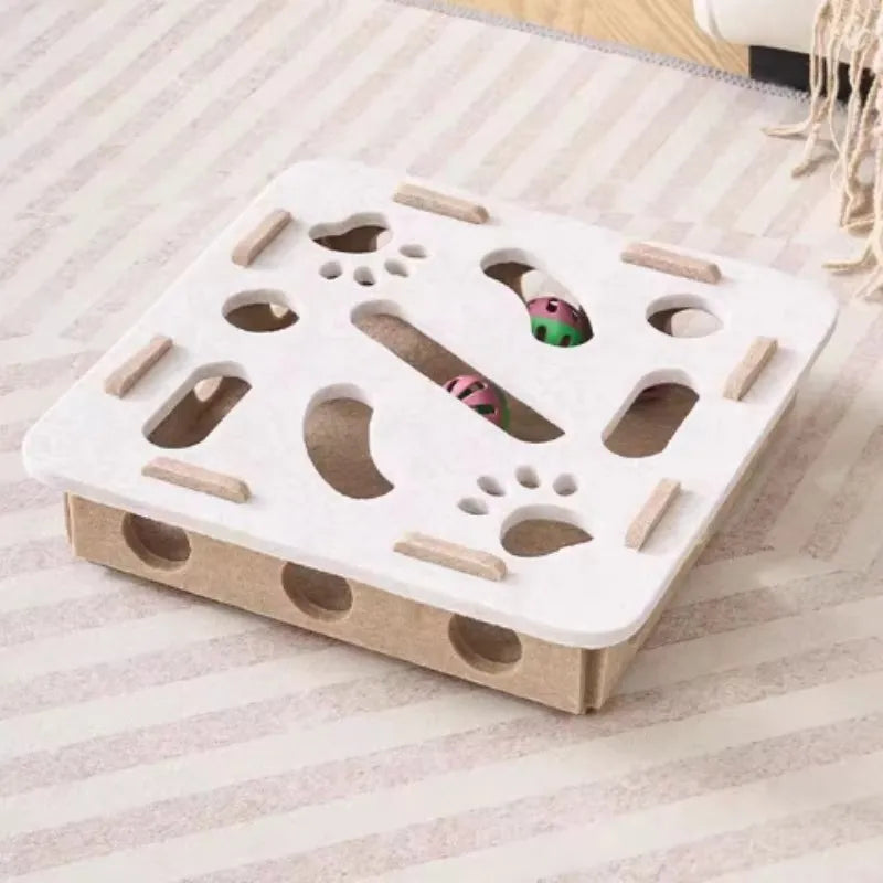 White puzzle maze for cats with holes and a wooden bell ball