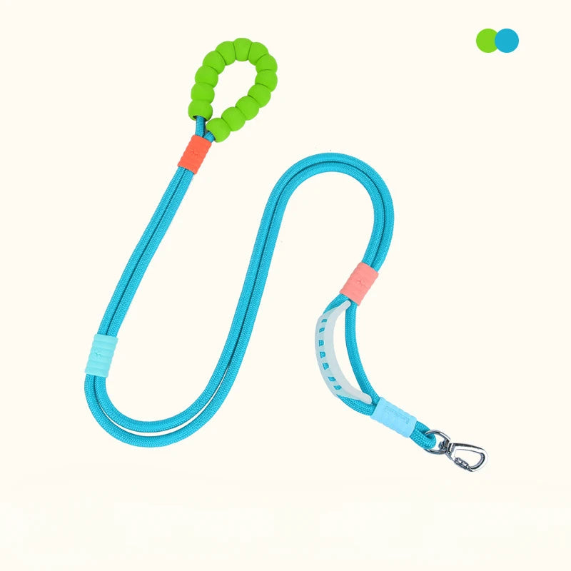 A bright blue adjustable hands-free dog leash with a green collar and a silver clip.