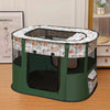 A dark green folding cat tent bed with a clear window and a patterned fabric cover sits on a wooden floor.