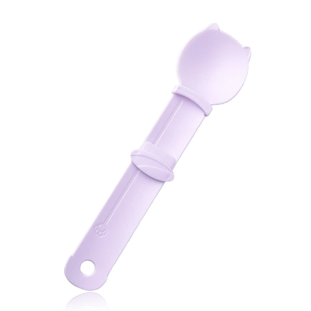 A light purple squeeze spoon feeder for liquid cat treats.