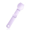 A light purple squeeze spoon feeder for liquid cat treats.