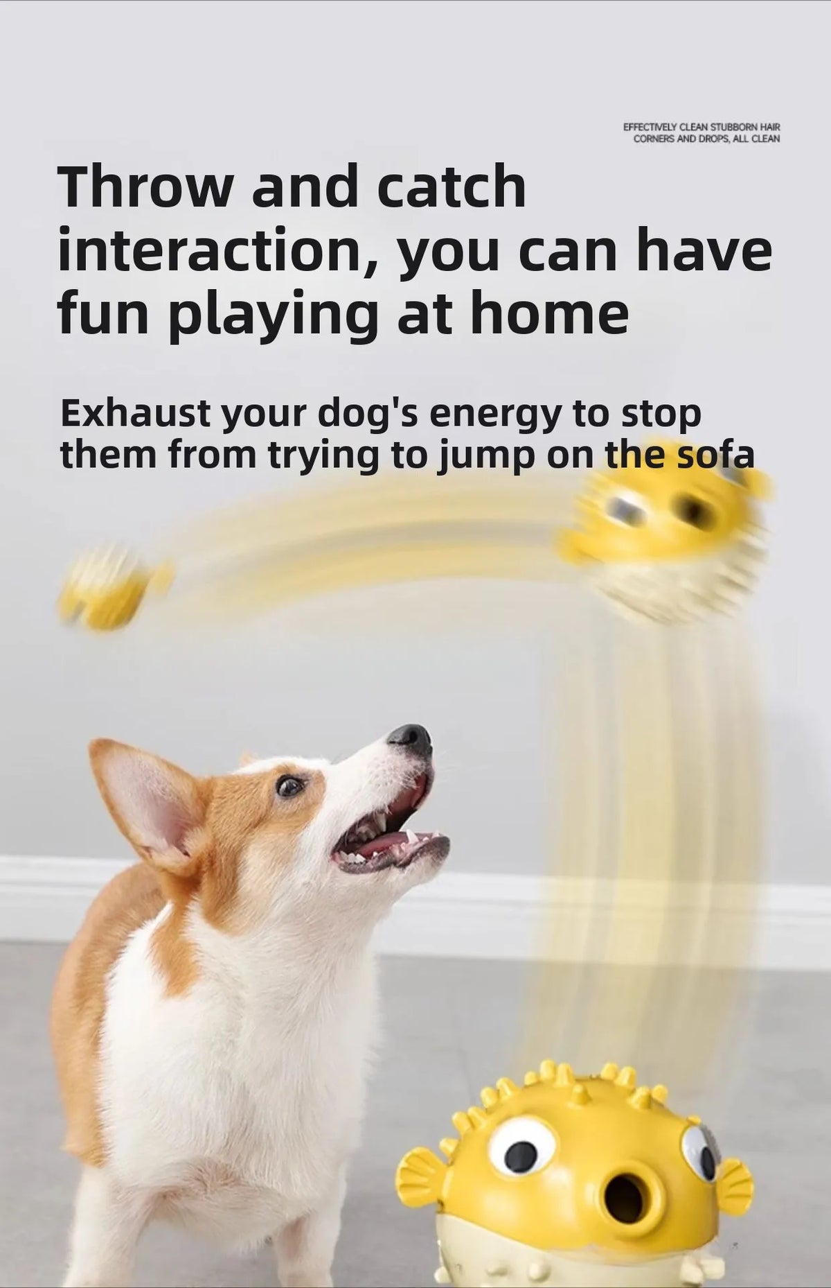 A dog is interacting with an interactive bouncing fish treat dispenser for cats and dogs.