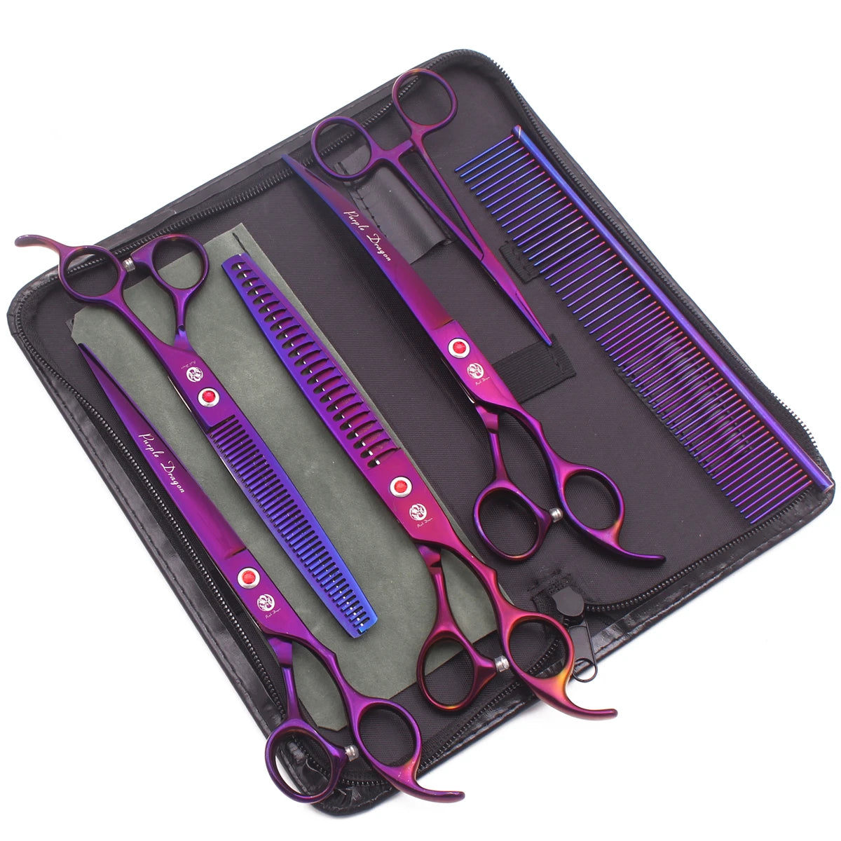 A black case holds a pair of purple professional stainless steel pet grooming scissors and a grooming comb.