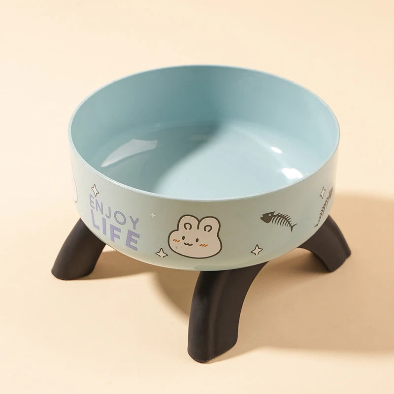Light blue stainless steel pet food bowl with a wooden stand and enjoy life text