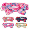 Pink floral nylon dog collar with an adjustable bowknot featuring various pink, blue, and green flowers.