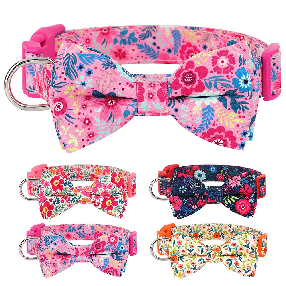 Pink floral nylon dog collar with an adjustable bowknot featuring various pink, blue, and green flowers.