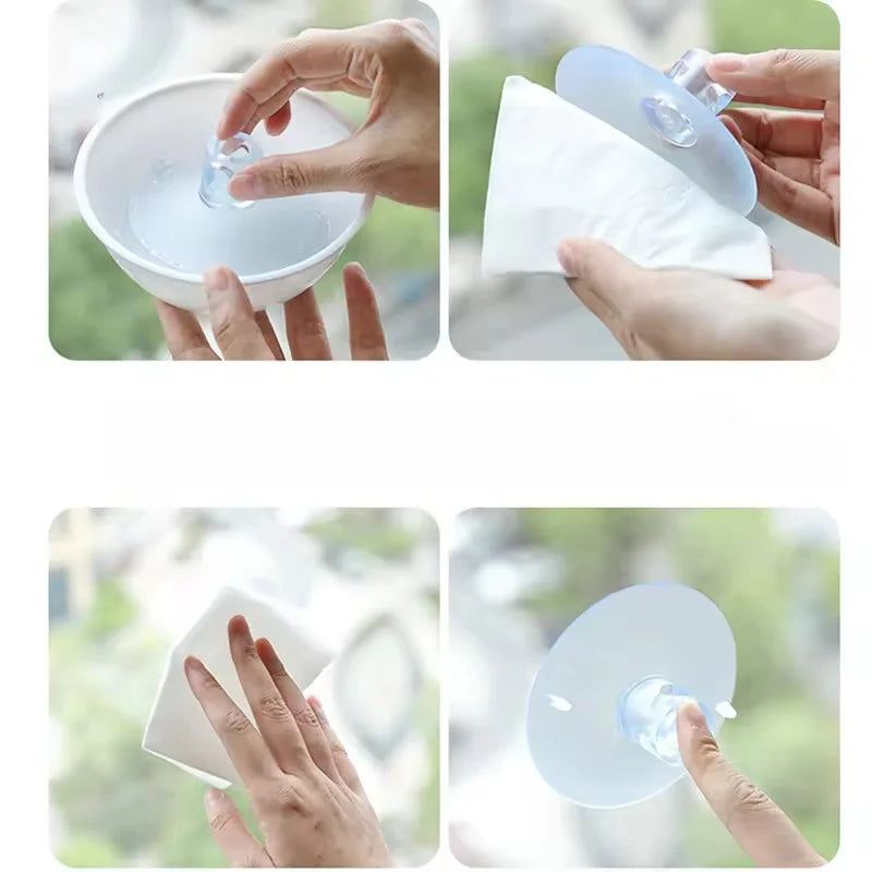 Mains utilisant un dispositif à ventouse pour nettoyer ou appliquer quelque chose sur une surface de fenêtre.