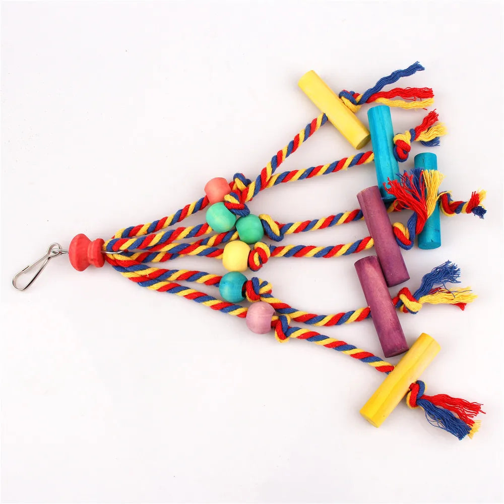 A collection of natural wood and cotton rope parrot chewing toys in various colors like yellow, blue, red, and purple.