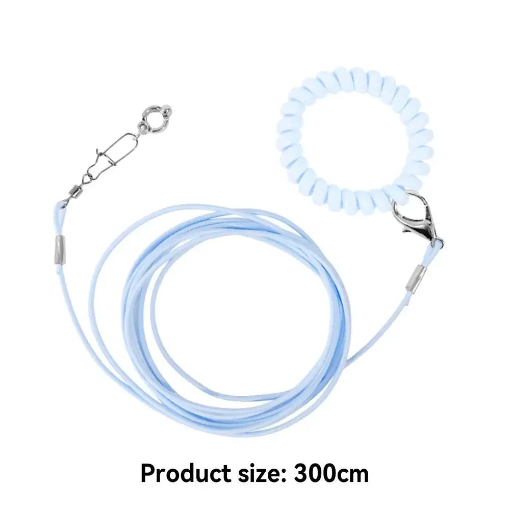 A light blue parrot flight training leash with a foot ring and a coiled cord.