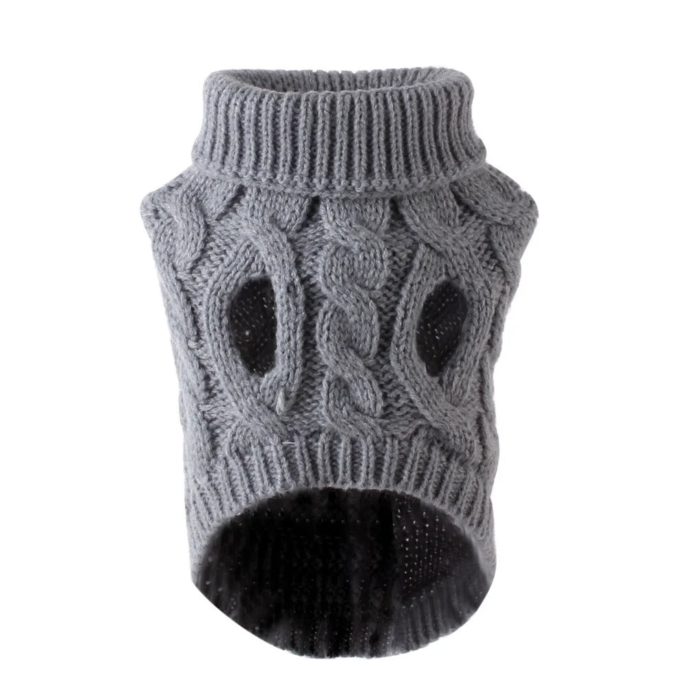Pull gris en tricot pour chiot, avec poignet côtelé et corps texturé.