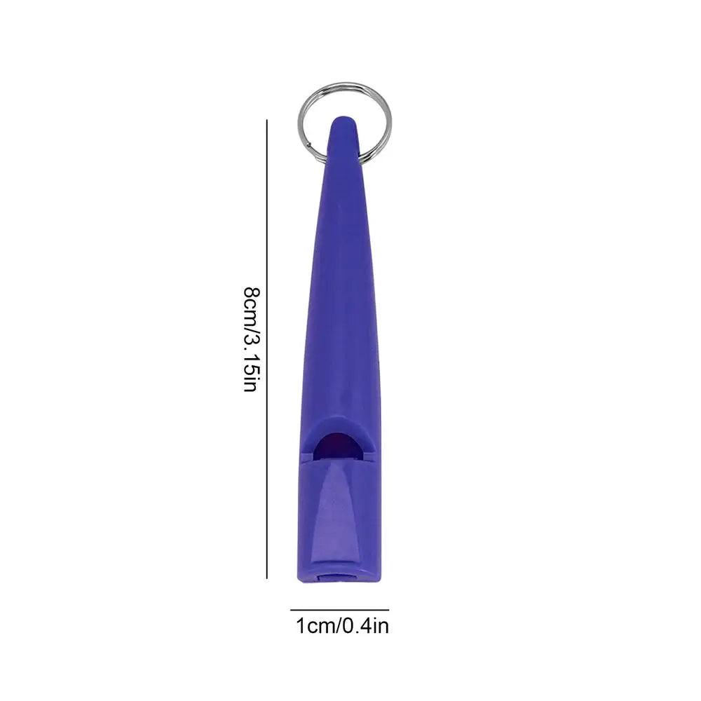Sifflet de dressage pour chien violet avec boucle métallique et design pointu.
