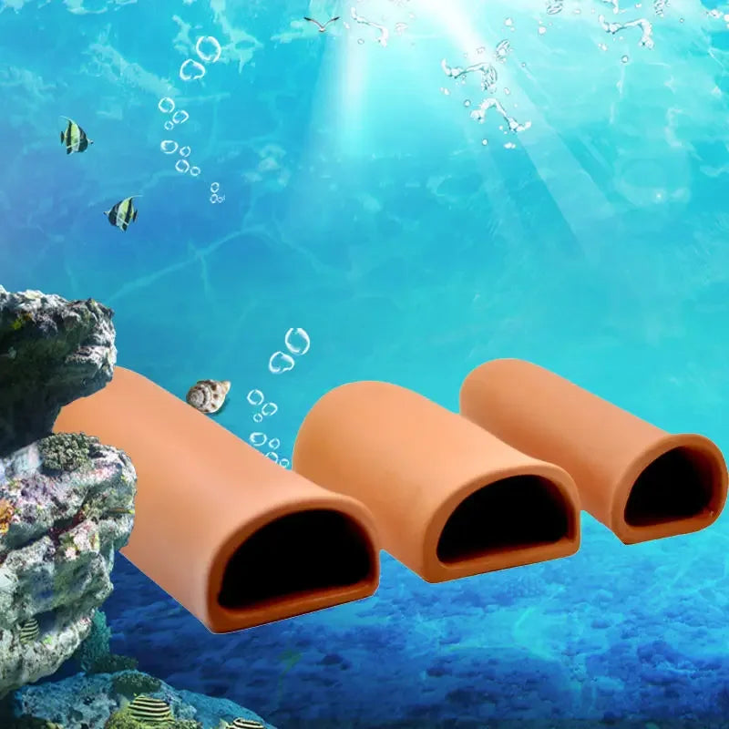 Orange ceramic aquarium breeding cave and shrimp shelter submerged underwater