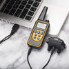 A handheld remote control dog training collar with a digital display showing 99% battery life and a black charging cable.