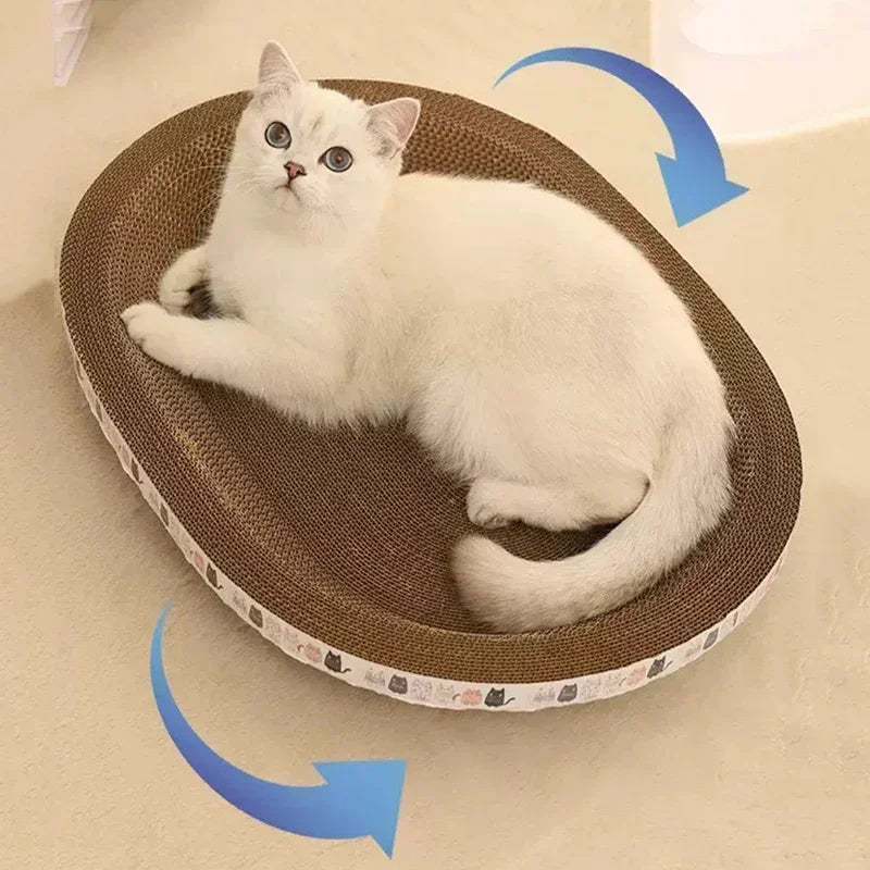 A white kitten is relaxing on a brown corrugated cat scratcher pad.