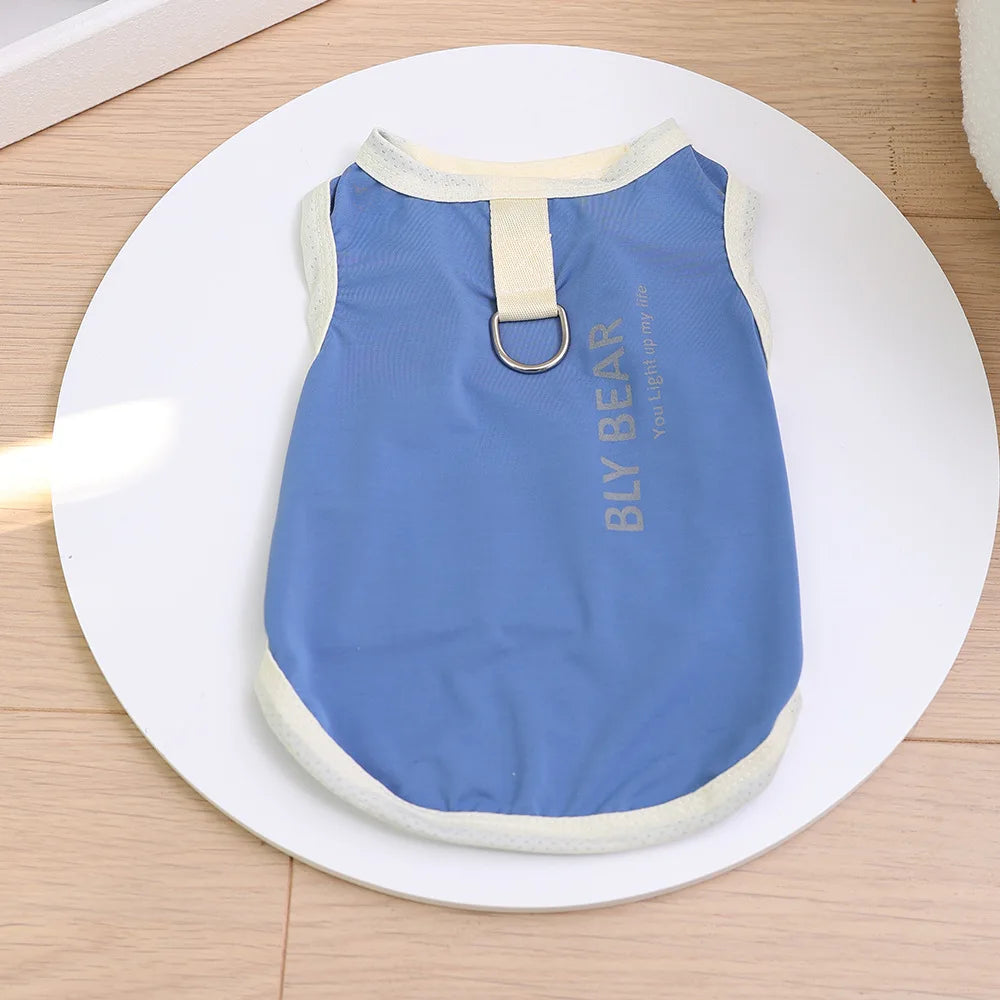 Light blue cooling dog vest with a beige strap and UV protection features