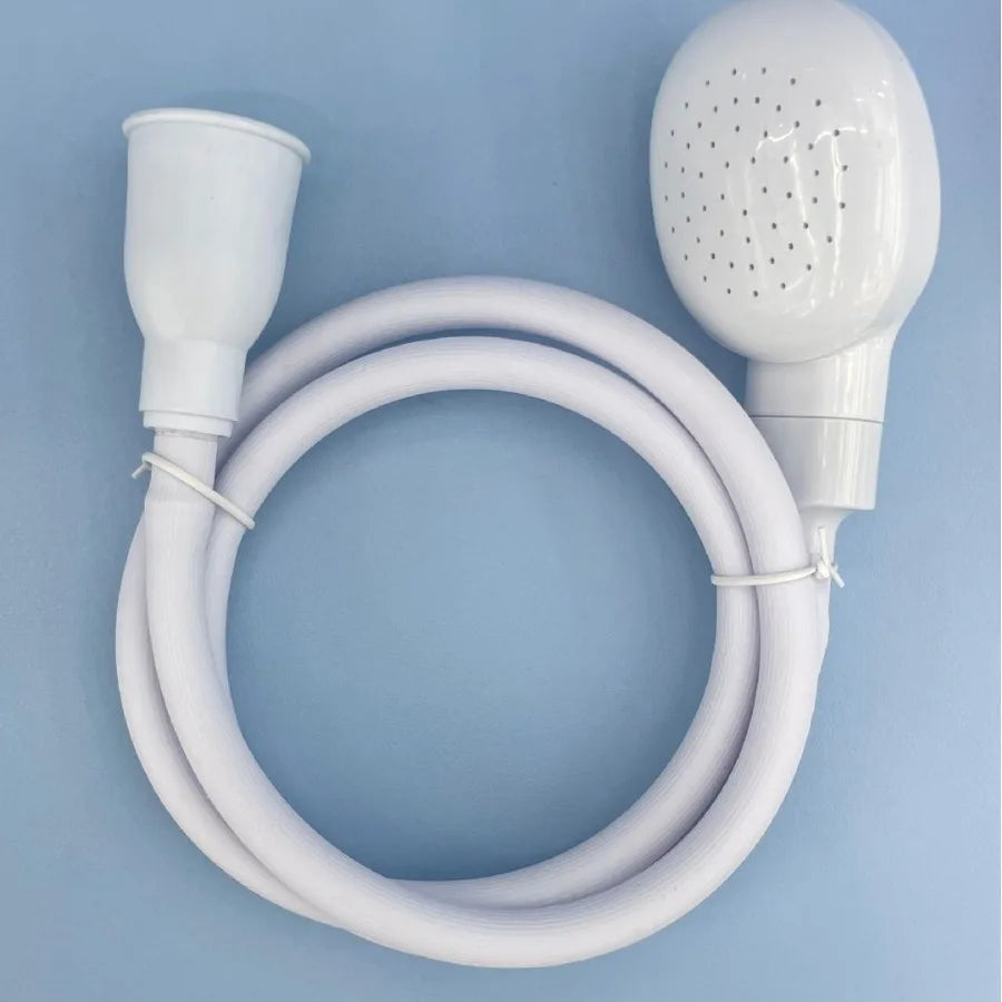 A white 360° portable faucet sprayer with a long hose coiled in a circle.