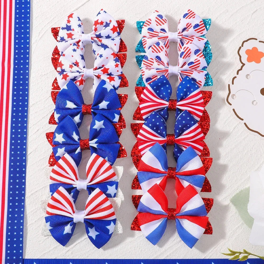 A set of six 3D printed star ribbon hair bows in red, white, and blue patterns with clips.
