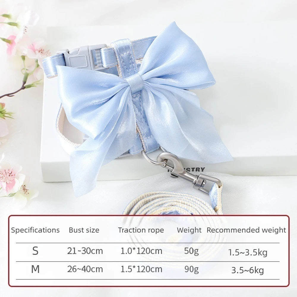Light blue adjustable cat harness and leash set featuring a decorative bow