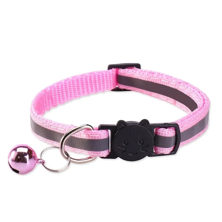 Pink and black safety breakaway cat collar with a bell and silver ring.