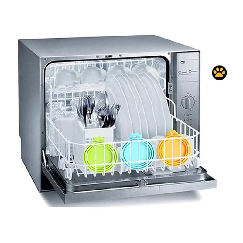 A silver pet food dispenser with a clear compartment holding various silicone bowls and spoons.