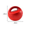 A bright red hexagonal TPR dog chew toy with a handle, shown from above.