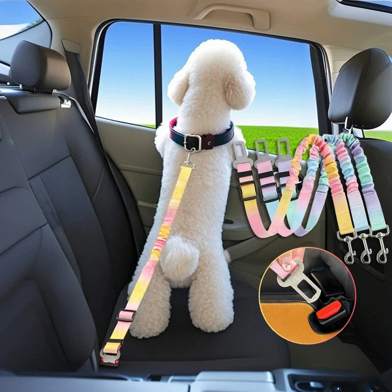A white dog wearing an adjustable traction rope safety harness is sitting in a car seat.