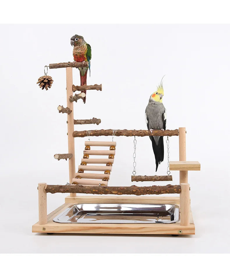 A wooden parrot climbing platform featuring branches and a bridge for birds.