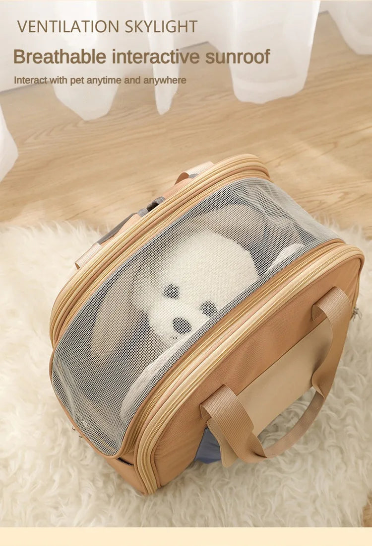 A beige breathable ventilation skylight pet carrier backpack with a mesh window is shown on a white fluffy surface.