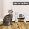 A white interior cat door with a clear flap is shown next to a tabby cat on a wooden floor.