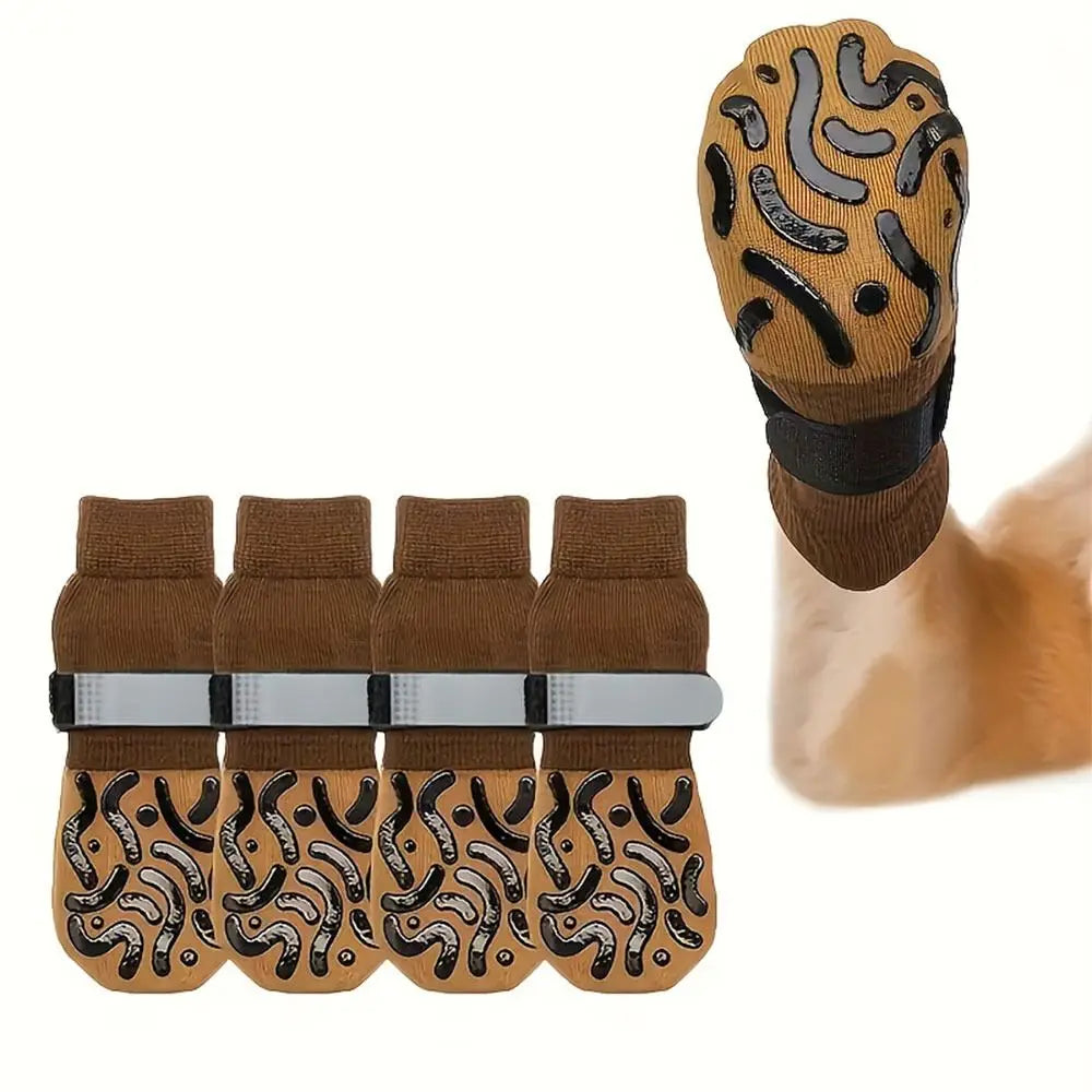 A pack of four anti-slip pet paw protection socks featuring a textured pattern on the sole.