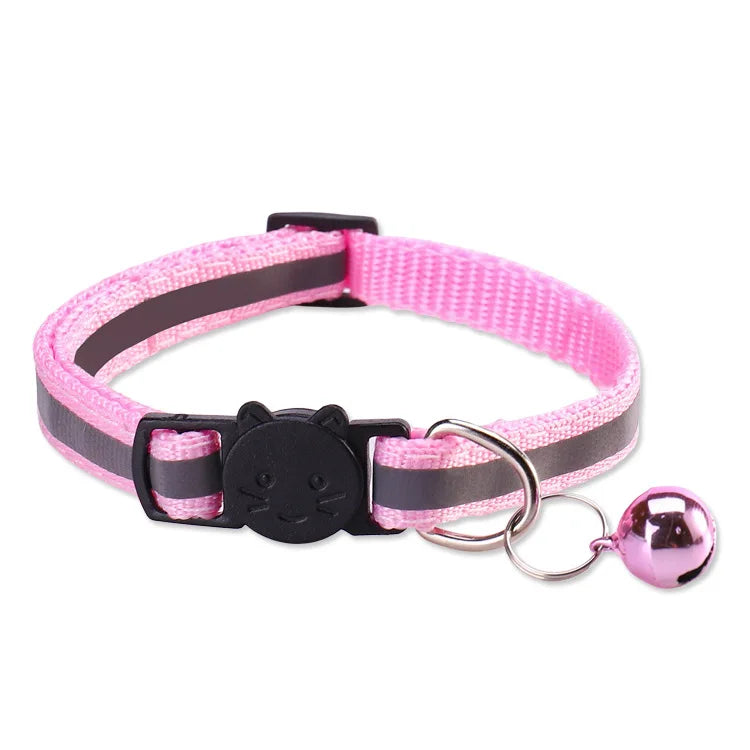 Pink and gray reflective nylon pet collar with a black cat charm and a silver bell attached.