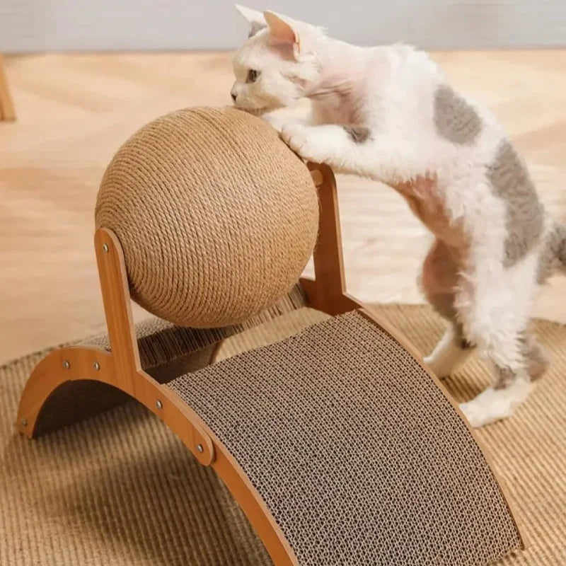 A white cat is interacting with a wooden scratching post and sisal ball toy.