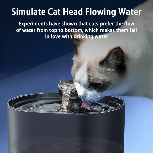 A cat is drinking water from a pet water fountain, demonstrating the flow of water.