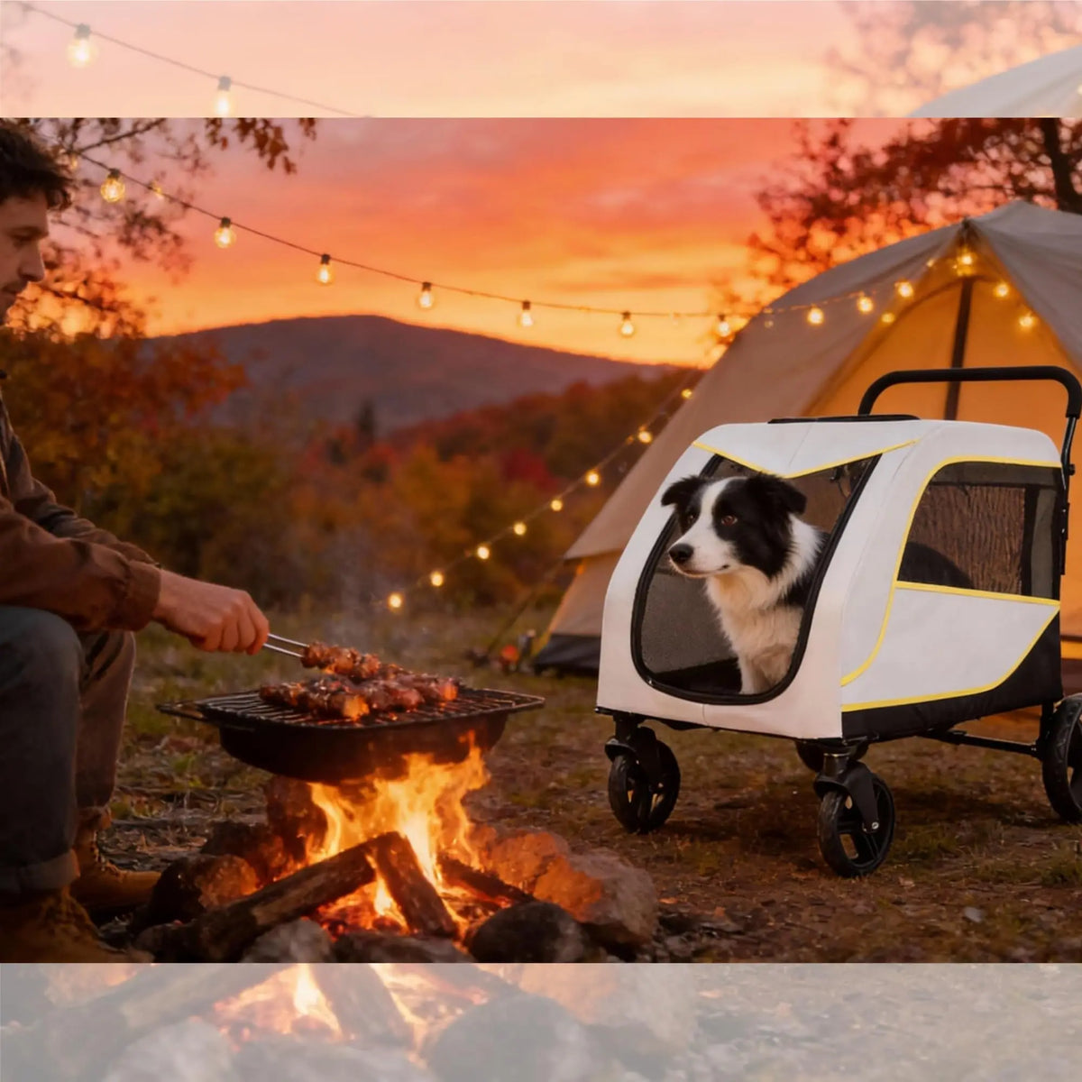 A dog is sitting inside a white all-terrain stroller next to a campfire under string lights.