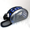 Transparent foldable pet travel carrier with a blue and white polka dot pattern and black shoulder strap