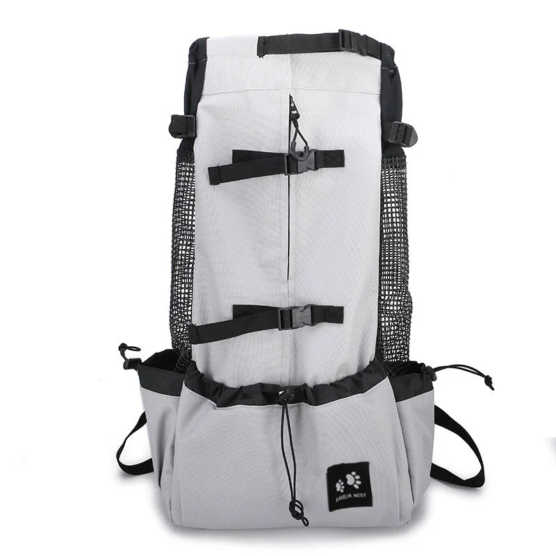 A gray breathable dog backpack carrier with black straps and mesh detailing.