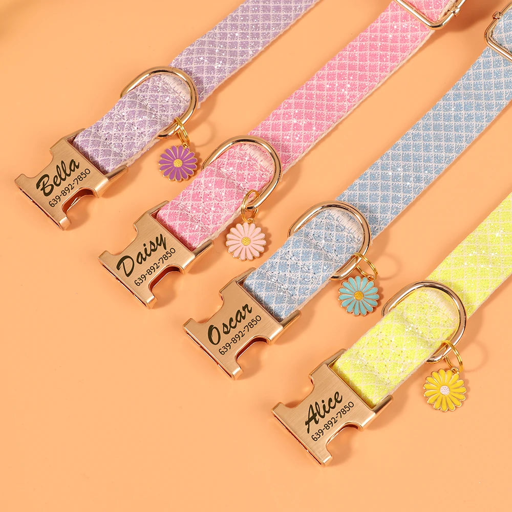 A collection of personalized bling nylon dog collars featuring various colors and engraved name tags like Bella, Daisy, Oscar