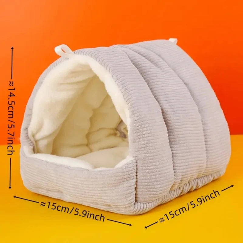 A light gray, quilted cotton bird nest designed for winter comfort.