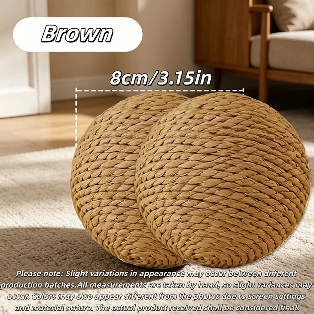 Brown natural sisal cat scratching ball shown in a close-up view