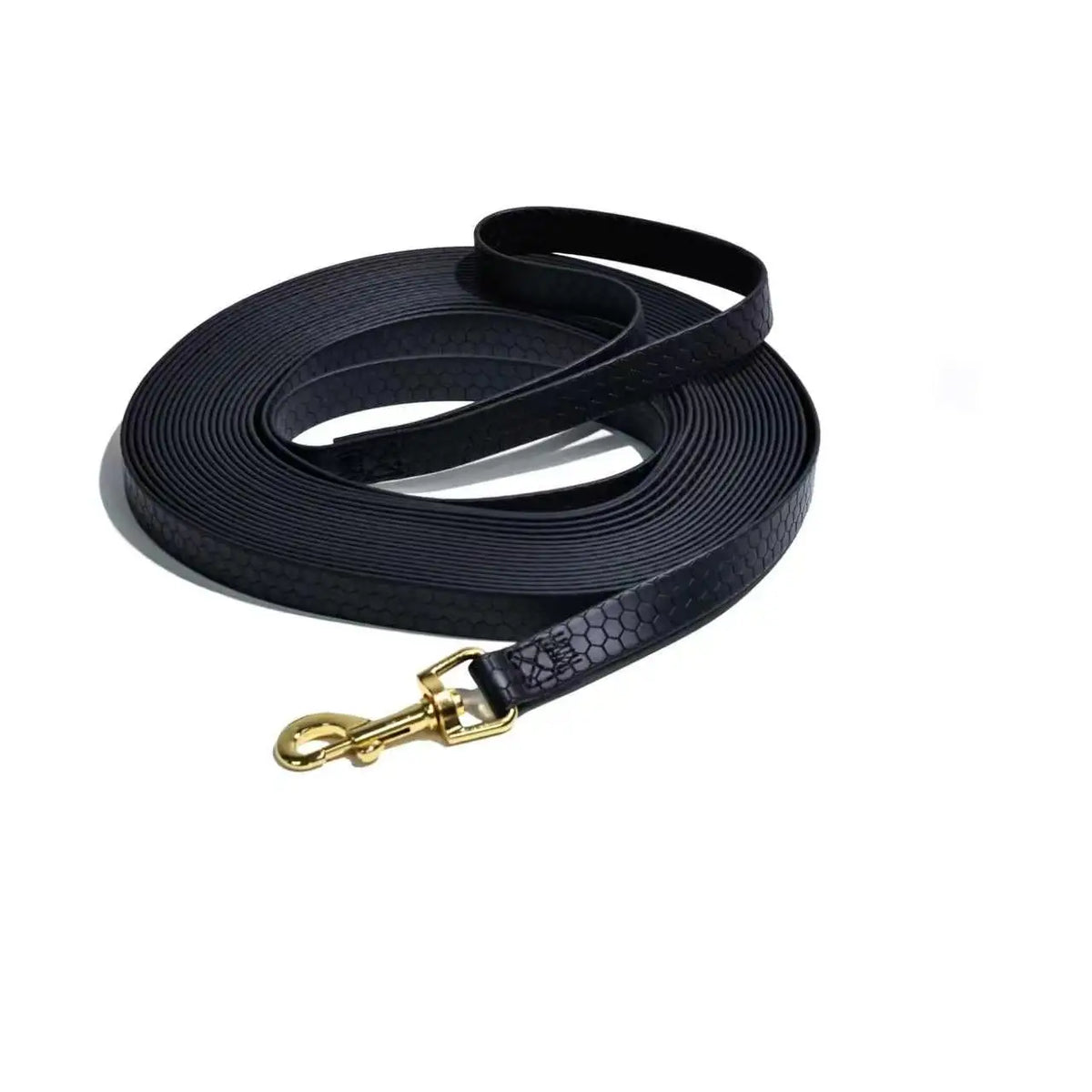 Black durable waterproof dog leash with a rustproof metal hook coiled on a white background.