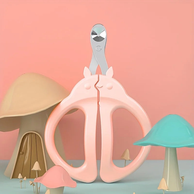 Pink cat-shaped nail clippers with safety guards displayed against a peach background.