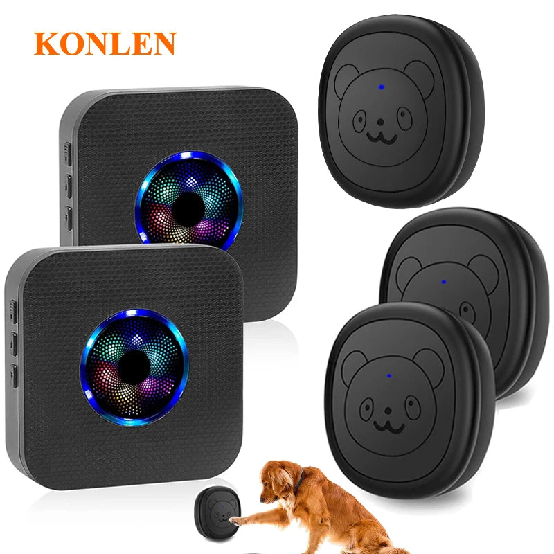 Black wireless dog doorbell with a camera and a button, shown next to various components and a dog.