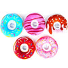 Un juego de cinco collares de protección para heridas para mascotas de colores brillantes en azul, rosa y naranja.