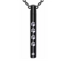 A black stainless steel pet memorial necklace with paw prints and a small engraved charm.