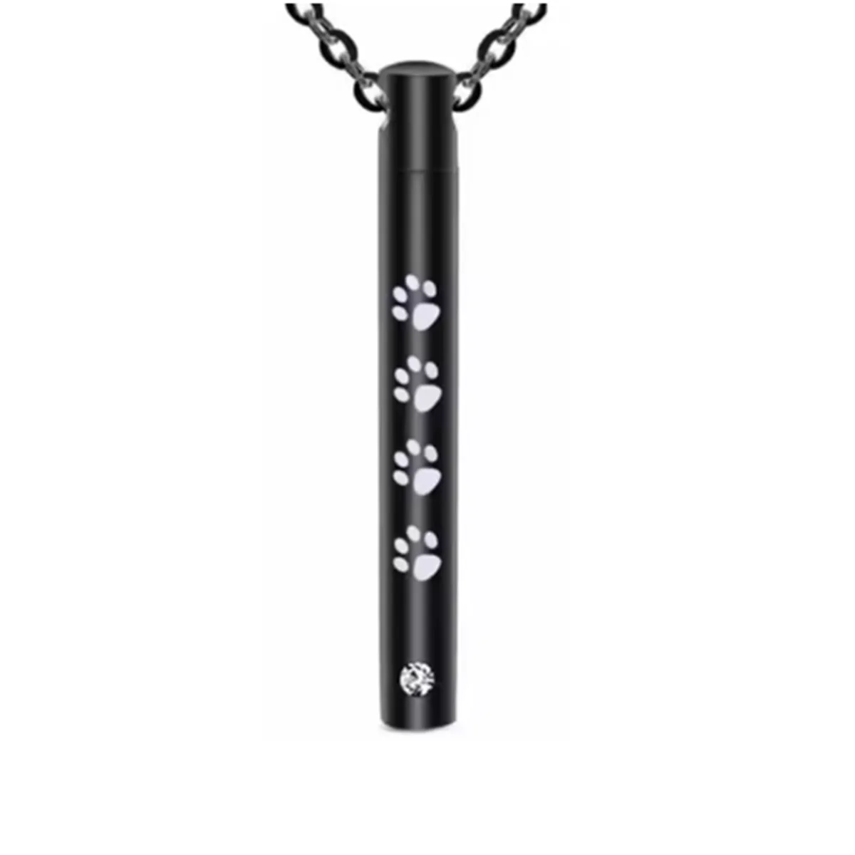 A black stainless steel pet memorial necklace with paw prints and a small engraved charm.