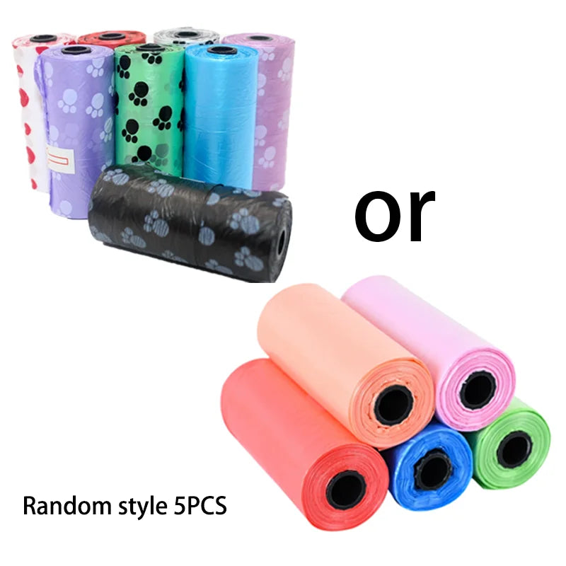 A collection of five rolls of pet waste bags in various colors including purple, green, blue, and pink, or a roll of black ba